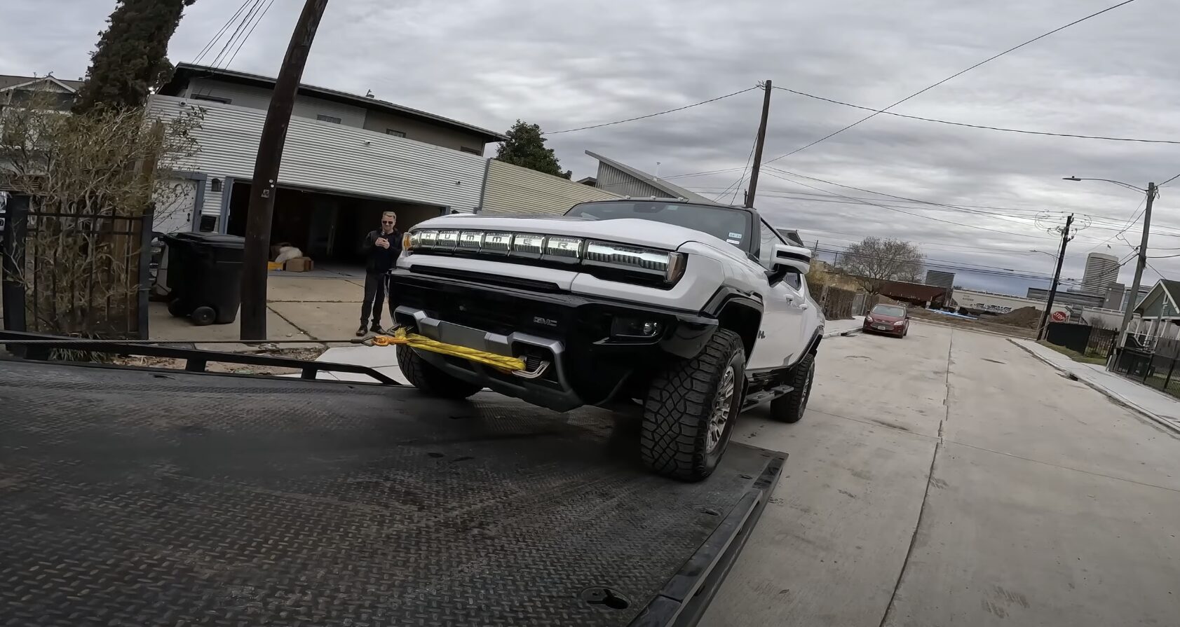 Professional towing truck loading a vehicle in Des Moines, WA